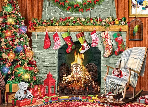 Christmas by the Fireplace -palapeli: Värikkäät joulusukat roikkuu takan reunuksella. Joulukuusi on koristeltu. Koko 67.3 x 48.9 cm. 500 palaa. Eurographics
