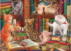 Library Kittens palapeli 1000 palaa on veikeä kuva kirjastosta, jossa kissanpennut leikkivät kirjoituspöydällä ja kirjahyllyssä.